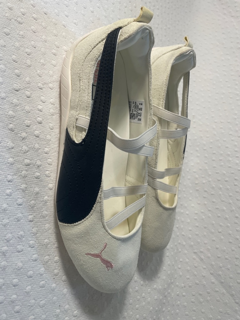 Puma Women's Ivory and Black Slip-On Athletic Flats with Pink Logo